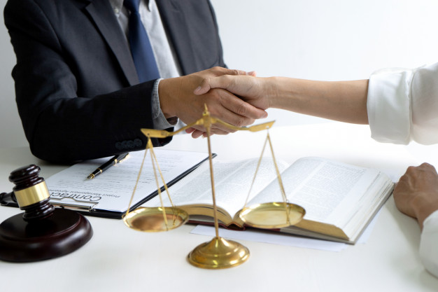 lawyer-judge-with-gavel-balance-handshake_93025-219